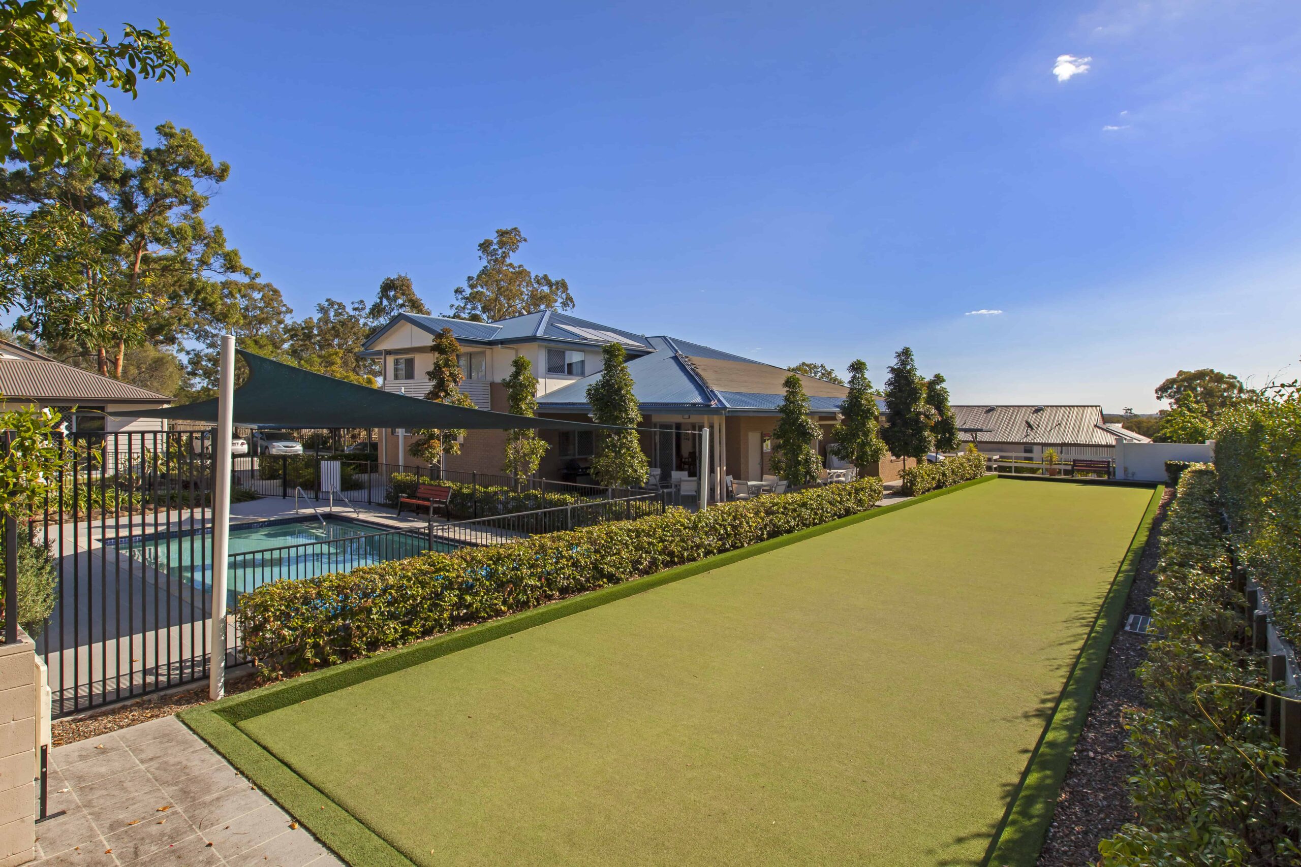 Lawn and pool area at on of our Oak Tree Retirement Villages Brisbane