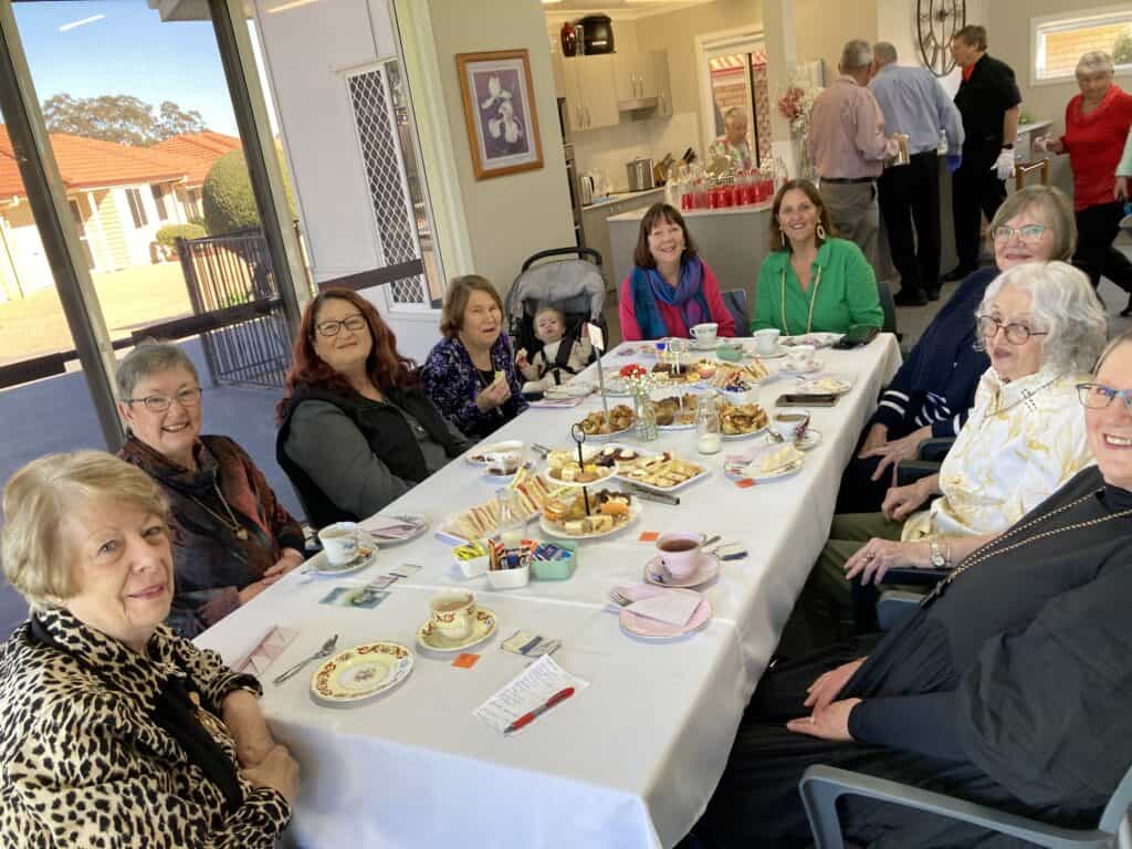 Seniors enjoying high tea event